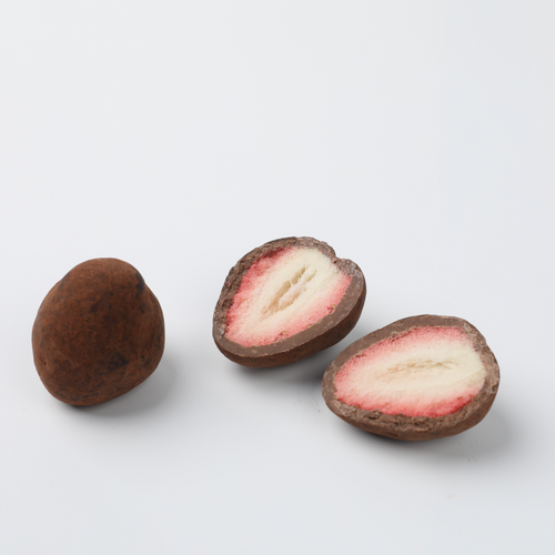 Milk chocolate covered freeze-dried strawberry