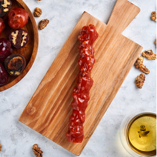 Sweet sujukh with walnuts and apricot flavor