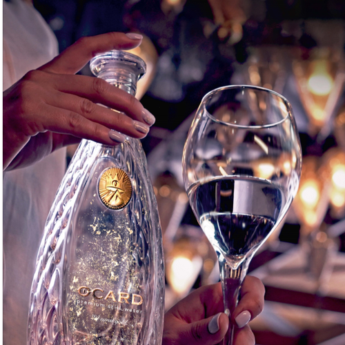 Natural drinking water with gold flakes OCARD