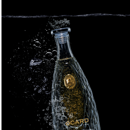 Natural drinking water with gold flakes OCARD